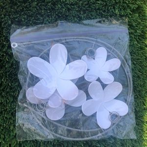 Hanging wire string with flower attachment